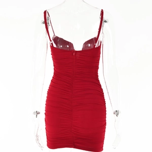 Detailed view of the back zipper and pleated design of this sexy red bodycon dress