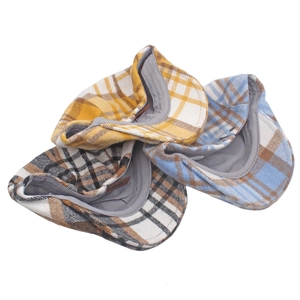 Three-piece set of checkered newsboy caps in diverse plaid patterns and warm wool fabric
