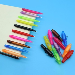 Multifunctional invisible UV light pens with colorful plastic body on a blue background