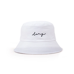 Detailed close-up of white cotton bucket hat featuring black lsny letter embroidery