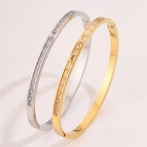 Macro detail of titanium steel bracelets with rectangular zircon inlay and snap closure