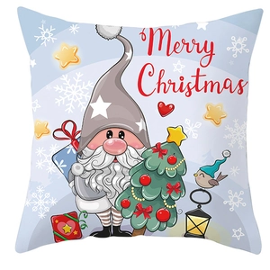 Detail of Christmas gnome pillowcase featuring vibrant cartoon dwarf and festive gift patterns