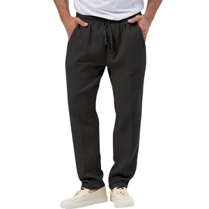 Detail of charcoal grey cotton linen trousers with adjustable drawstring elastic waist