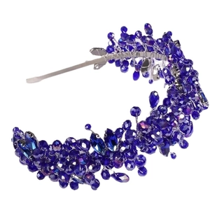 Exquisite bridal crystal headband featuring deep blue beaded glass crystals on silver band