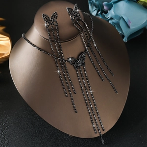 Elegant black butterfly jewelry set with long tassel necklace and matching earrings