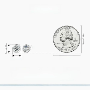 Size comparison of 7mm cubic zirconia stud earrings next to a quarter coin