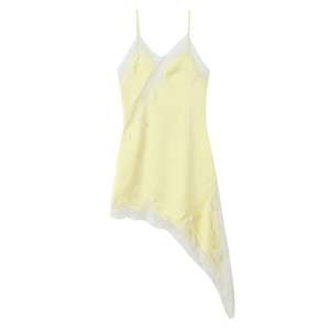 Pale yellow asymmetric slip dress with white lace panels and V-neckline detail
