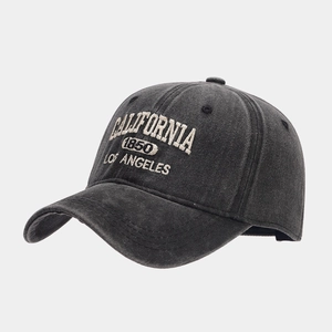 Detail of vintage washed grey baseball cap with cream California 1850 embroidery