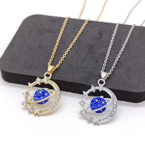 Blue planet and moon pendant necklaces in gold and silver finish with crystal stones