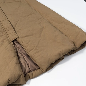 Quilted brown winter jacket with lapel collar and soft lining in a loose casual fit