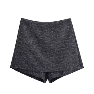 Chic dark gray tweed skort featuring a stylish high-waist design and side zipper closure
