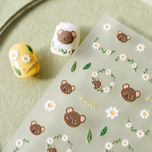 3D relief nail art stickers featuring sweet brown bears and white daisies on a green base