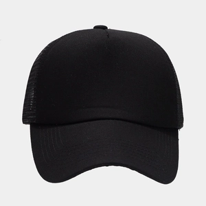 Detailed close-up of a black trucker hat showing the breathable mesh and reinforced visor stitching