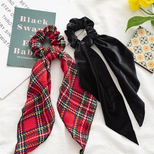 Christmas hair scrunchies set in red plaid fabric and black velvet with long ribbons