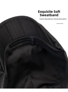 Detail shot of black cotton sweatband inside a men's newsboy cap with soft stitching