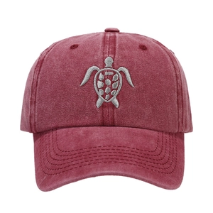 Washed dark red baseball cap featuring detailed silver sea turtle embroidery and curved brim