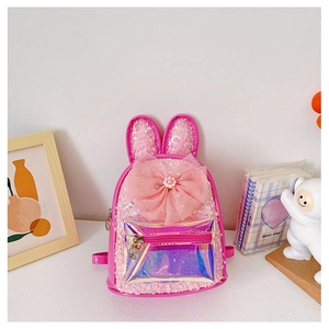 Close-up of pink sequin backpack with bunny ears, large mesh bow, and transparent pocket