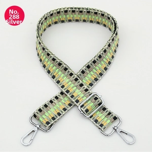 Detail of adjustable geometric woven strap with silver metal swivel hooks No. 288