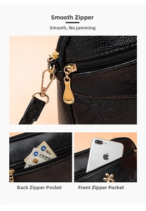 Close-up detail of women's black leather crossbody bag with smooth gold zippers and pockets.
