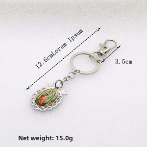 Detail showing Our Lady of Guadalupe pendant keychain with dimensions of 12.6cm and 3.5cm