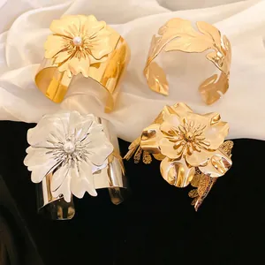 Chunky metallic flower open bangles with pearls and leaf designs in gold and silver