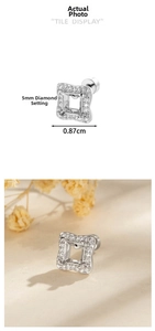Macro detail of a 5mm square silver ear stud mount with zircons for jewelry making
