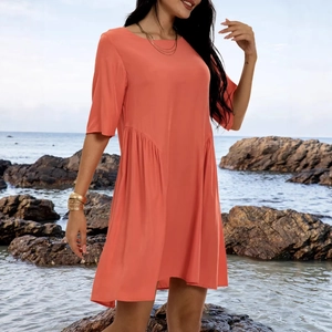 Coral pleated short sleeve dress with round neck for summer beach vacation look
