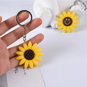 Vibrant sunflower PVC keychain set with yellow petals and silver metal chain accessory