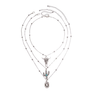 Silver multi-layer necklace set with turquoise cactus and steer skull pendants