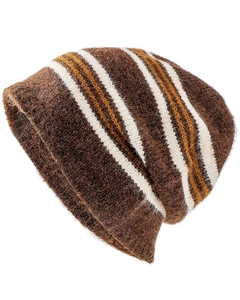 Close-up of brown knit beanie with white and golden stripes showing soft wool texture