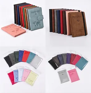 Collage of marble pattern PU leather passport covers with map design and elastic closures