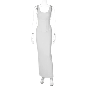 Detail view of white sleeveless dress with lace-up corset waist and slim long skirt