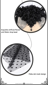 Detail of gothic horn headband featuring black faux flowers and polka dot mesh veil