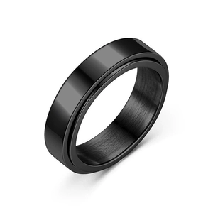 Minimalist black spinning titanium steel ring with a brushed matte finish for women