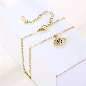 Gold stainless steel evil eye pendant necklace with blue crystal and cubic zirconia