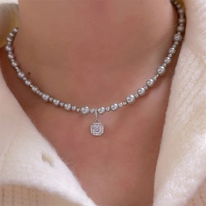 French luxury square pendant pearl necklace with silver-gray pearls and sparkling crystals