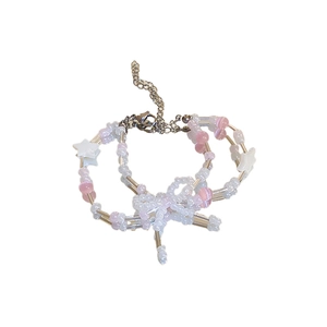 Double-layered sweet beaded bracelet with pink bow charm and silver star pendant