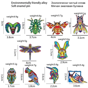 Collection of colorful alloy animal pins featuring bee, owl, and parrot designs