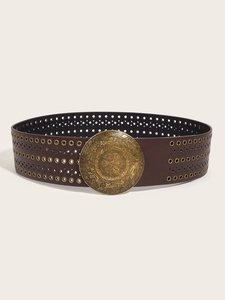 Detail of wide brown PU leather belt with vintage hollow brass buckle and metal eyelets
