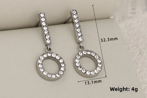 Detailed size view of silver tassel earrings with sparkling rhinestones and open circle