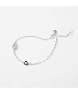 Detail of S925 silver bracelet featuring Hamsa hand and blue evil eye charms with cubic zirconia