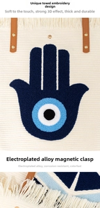 Detail of bohemian woven tote bag with Hamsa Hand towel embroidery and magnetic buckle