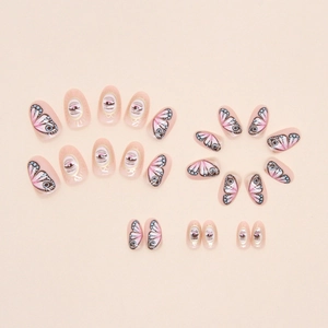 Oval press-on nails with surreal eye and pink butterfly wing patterns in retro style