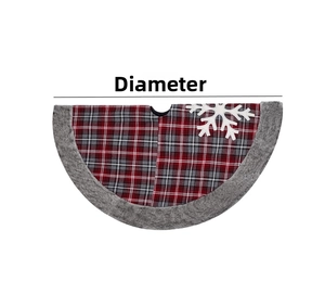 Detail of red and grey plaid Christmas tree skirt with plush faux fur trim and snowflake