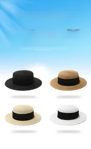 Flat top straw boater hats in four colors with satin ribbon and white polka dots