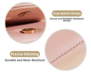 Detail of pink wallet showing gold magnetic snap closure and precise reinforced stitching