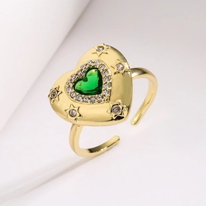 Vintage 18K gold plated heart ring with green gemstone and star engravings