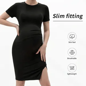 Slim fit black short sleeve maternity dress with side slit design and stretch fabric