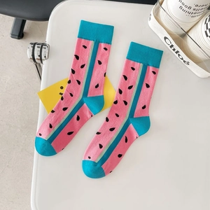 Pink crew socks with watermelon pattern and contrasting blue heel and toe design