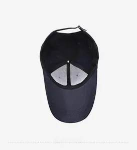 Detailed interior of the navy baseball cap showing stitched seams and adjustable buckle